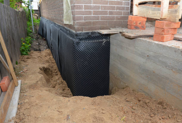 Happy homeowners after waterproofing job in York